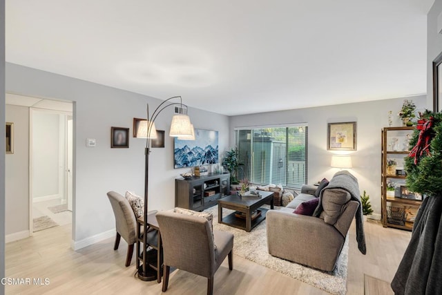 living room featuring light wood-type flooring