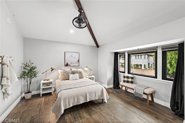 bedroom featuring dark hardwood / wood-style floors and lofted ceiling with beams