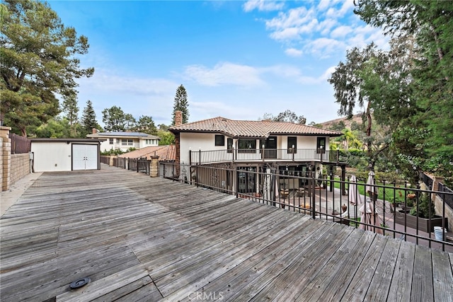 wooden deck with a shed