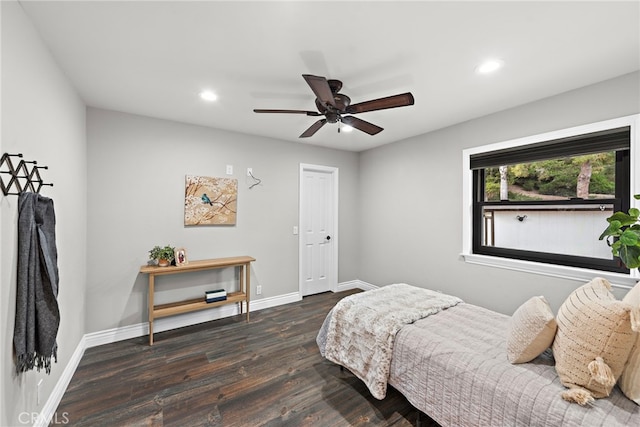 bedroom featuring ceiling fan and dark wood-type flooring