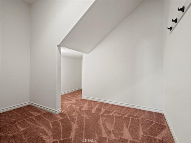 26420 Township St, Saugus, CA 91350 - bonus room with baseboards, lofted ceiling, and carpet