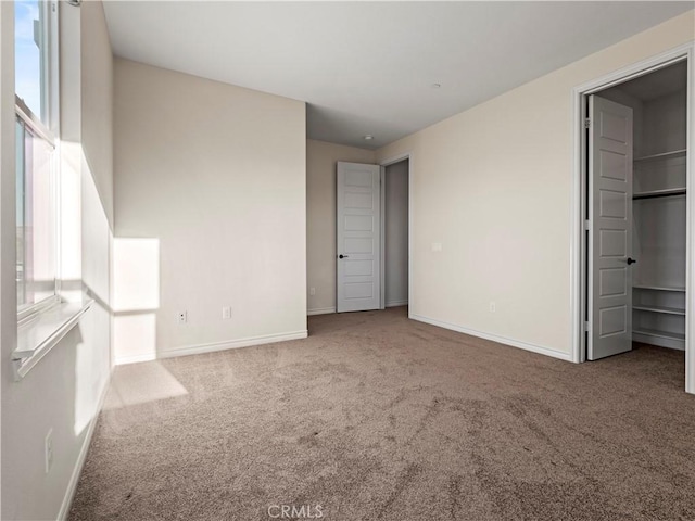 unfurnished bedroom with carpet floors