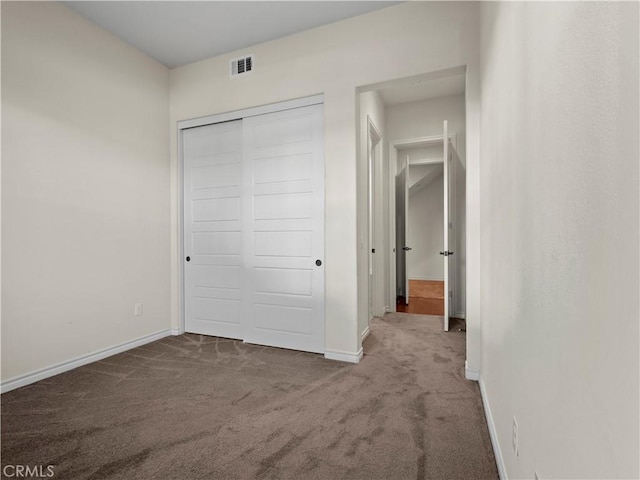 26420 Township St, Saugus, CA 91350 - unfurnished bedroom with a closet, baseboards, visible vents, and carpet floors