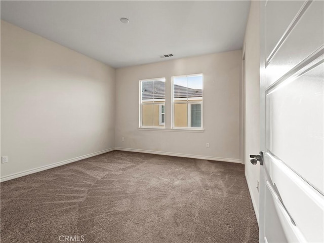 view of carpeted spare room