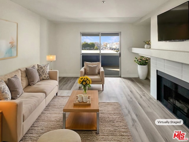 living room featuring light wood-type flooring