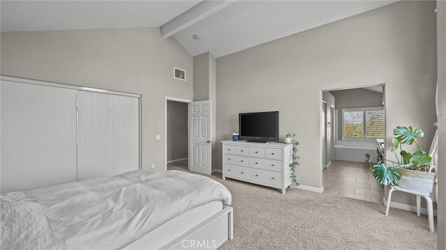 bedroom featuring beamed ceiling, light colored carpet, high vaulted ceiling, and a closet