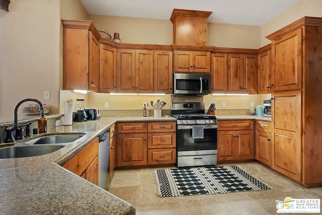 kitchen featuring appliances with stainless steel finishes and sink