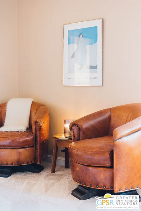 living area with carpet