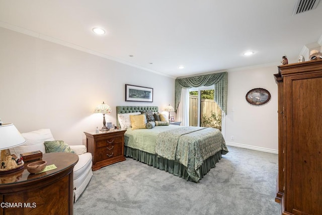 bedroom featuring ornamental molding and light carpet