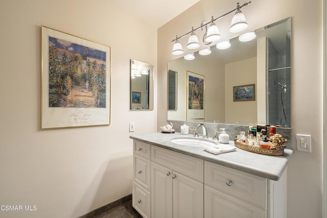 bathroom featuring tile patterned flooring and vanity