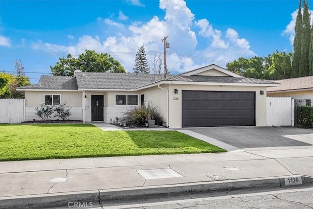 single story home with a front lawn and a garage