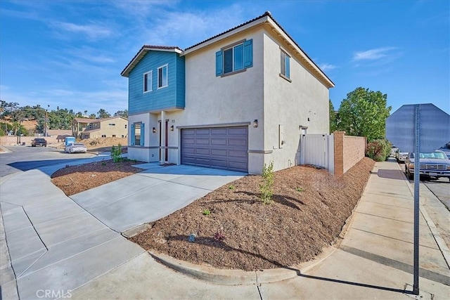 front of property with a garage