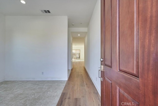 foyer with light hardwood / wood-style flooring