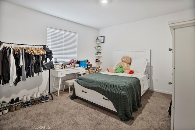 bedroom with light carpet