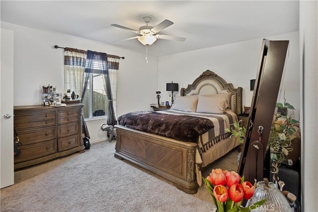 bedroom featuring ceiling fan and carpet floors