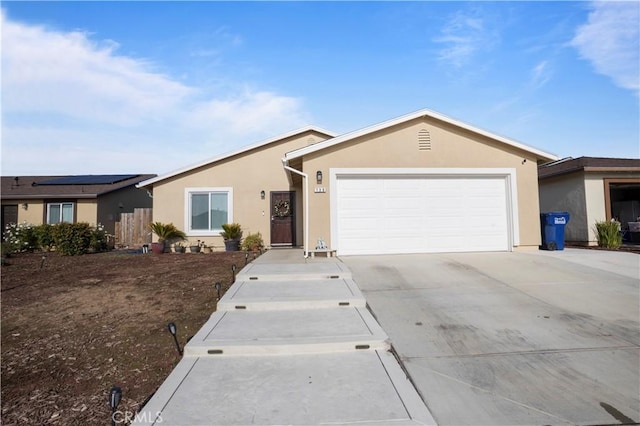 single story home with a garage