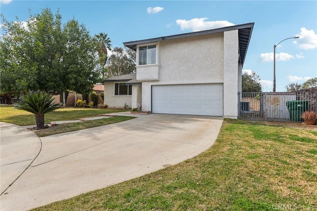 front of property with a garage and a front lawn