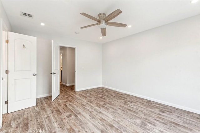 unfurnished bedroom featuring ceiling fan and light hardwood / wood-style floors