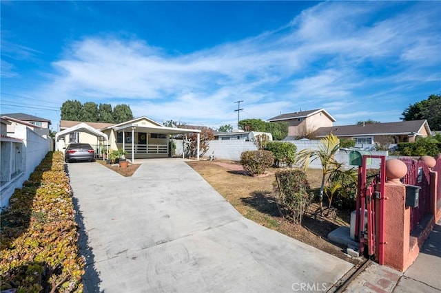 view of front of house with a carport