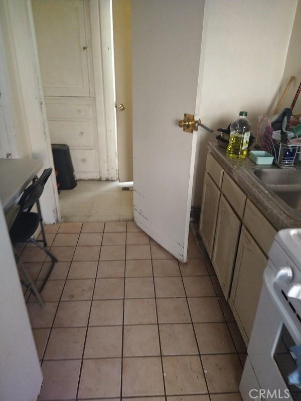 bathroom with sink and tile patterned floors