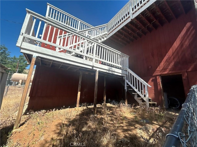 view of home's exterior featuring a wooden deck