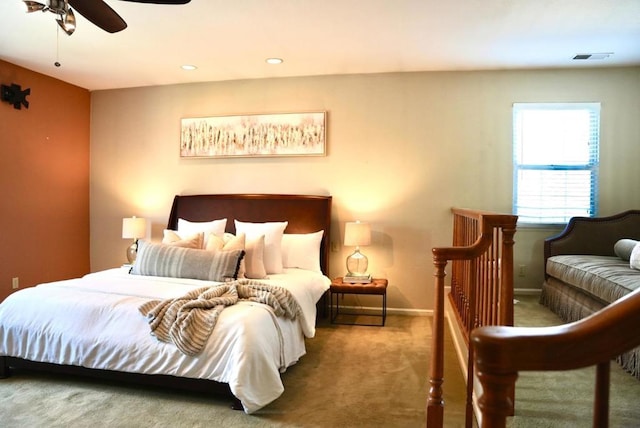 carpeted bedroom featuring ceiling fan