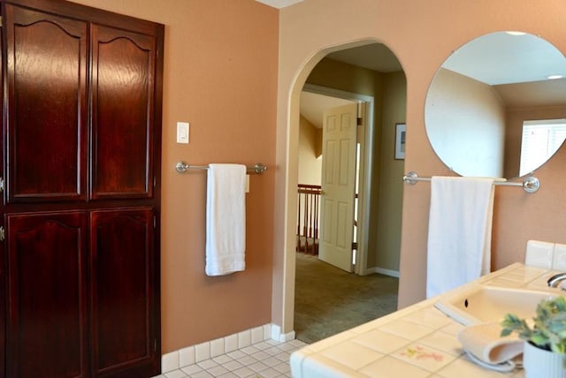 bathroom with sink and tile patterned floors