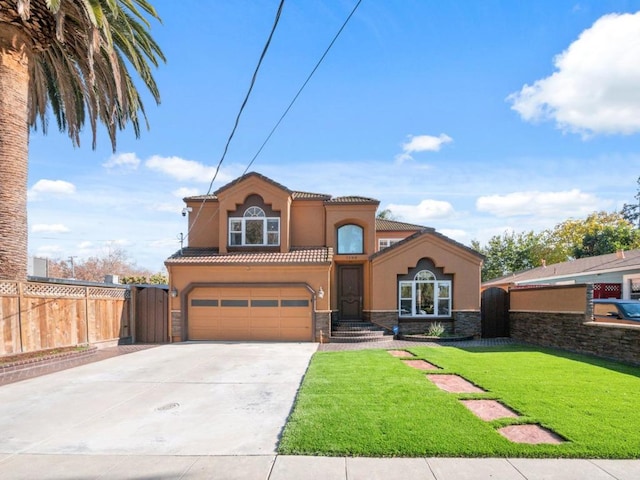 mediterranean / spanish-style home with a front yard and a garage