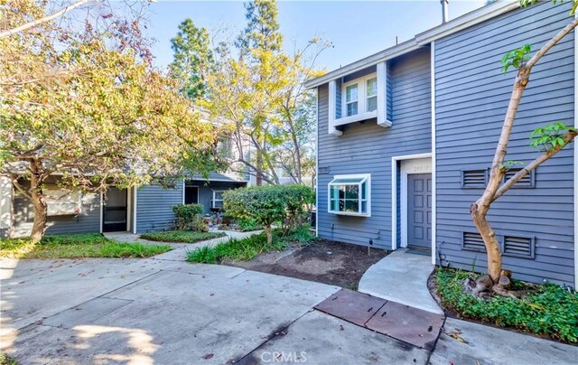 rear view of house with a patio