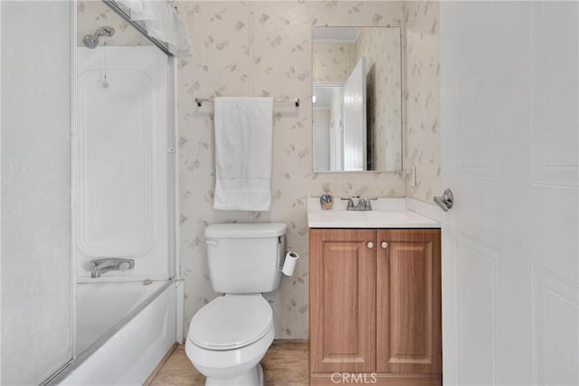 full bathroom with vanity, toilet, and combined bath / shower with glass door