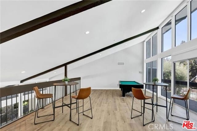 game room with beam ceiling, light hardwood / wood-style flooring, high vaulted ceiling, and pool table