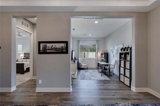 hall featuring dark wood-type flooring