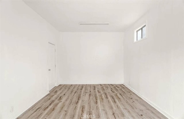 unfurnished room featuring light hardwood / wood-style flooring