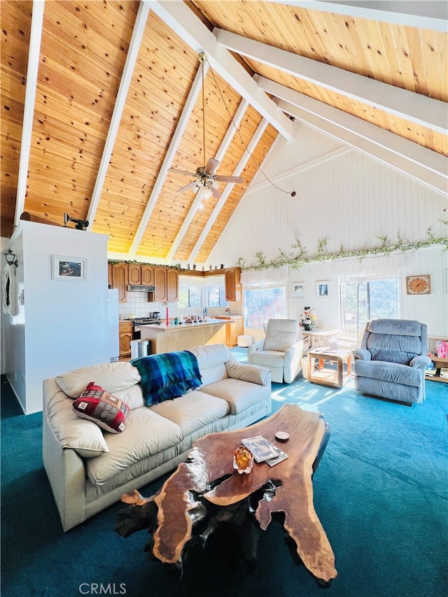 living room with carpet, beamed ceiling, high vaulted ceiling, ceiling fan, and wooden ceiling