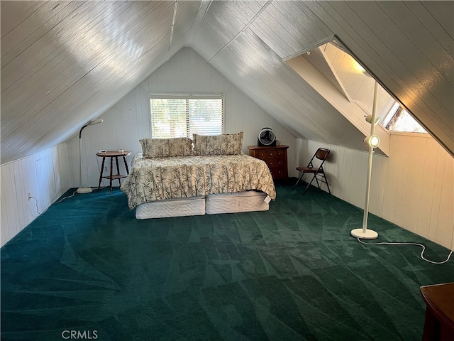 carpeted bedroom with lofted ceiling with skylight and wooden walls