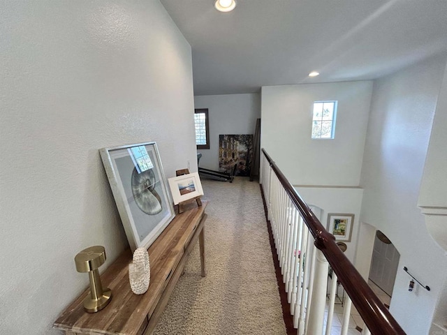 corridor with carpet flooring