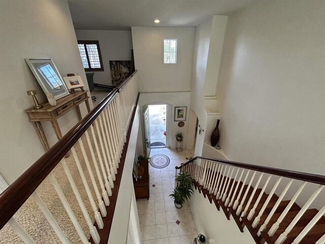 staircase with a healthy amount of sunlight