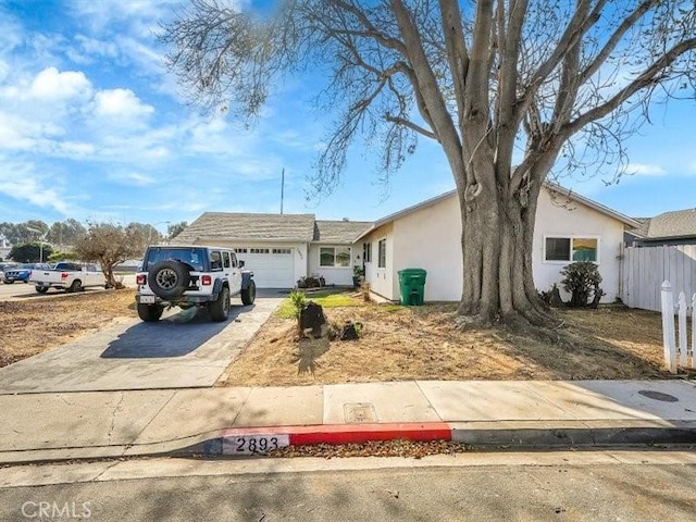 ranch-style home with a garage