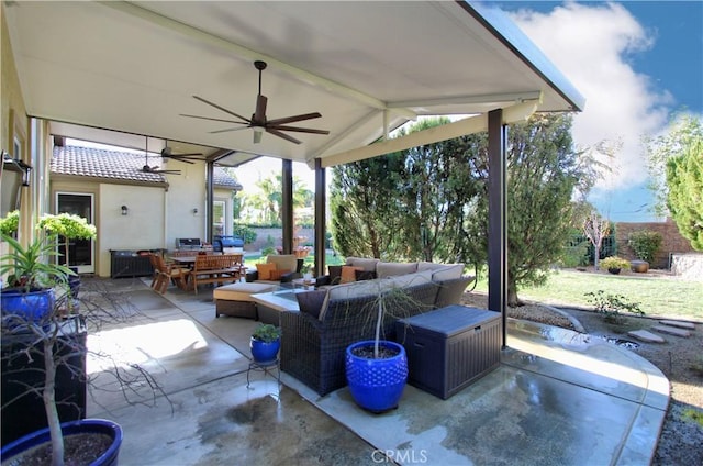 view of patio featuring an outdoor living space and ceiling fan