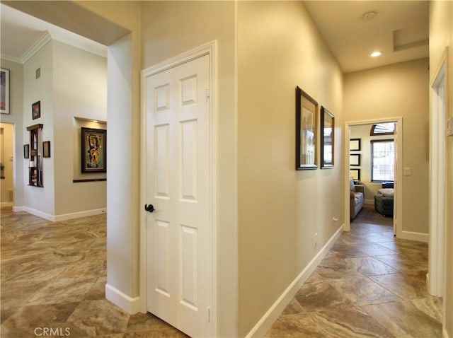 hallway with crown molding