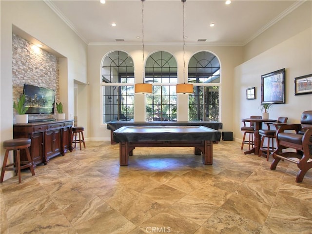 game room with crown molding and billiards