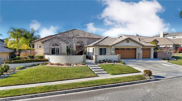 view of front facade featuring a garage and a front lawn