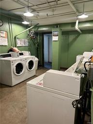 laundry room with separate washer and dryer