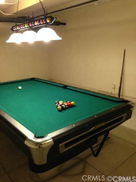 game room with tile patterned floors and billiards