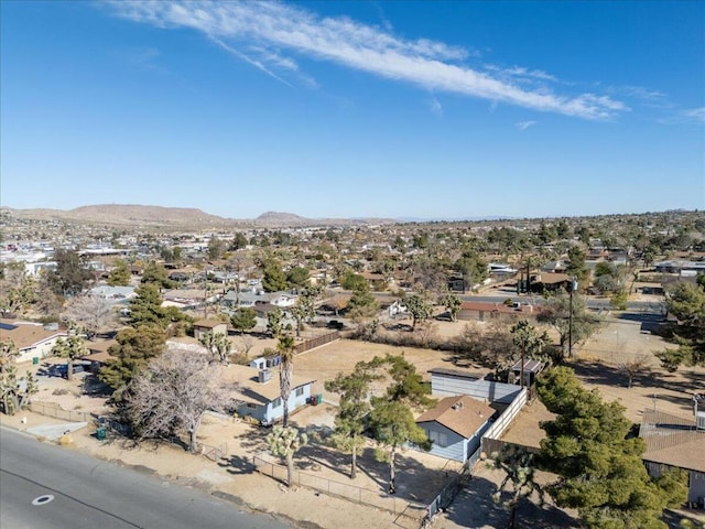 drone / aerial view featuring a mountain view