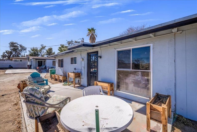 rear view of house with a patio area