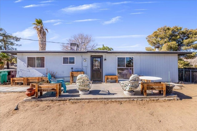 back of house featuring a patio