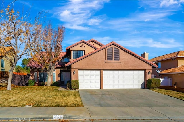 view of front facade featuring a garage, stucco siding, and a front yard