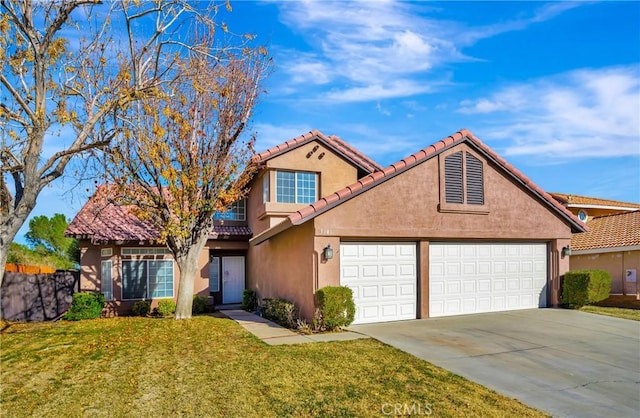 view of front of property featuring a front lawn and a garage