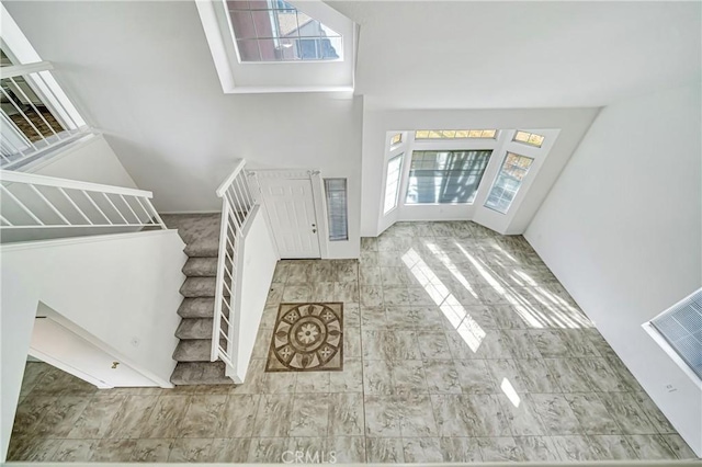 entryway featuring stairway and visible vents